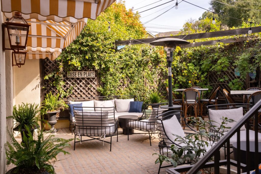 One of two courtyard patios at Petit Soleil