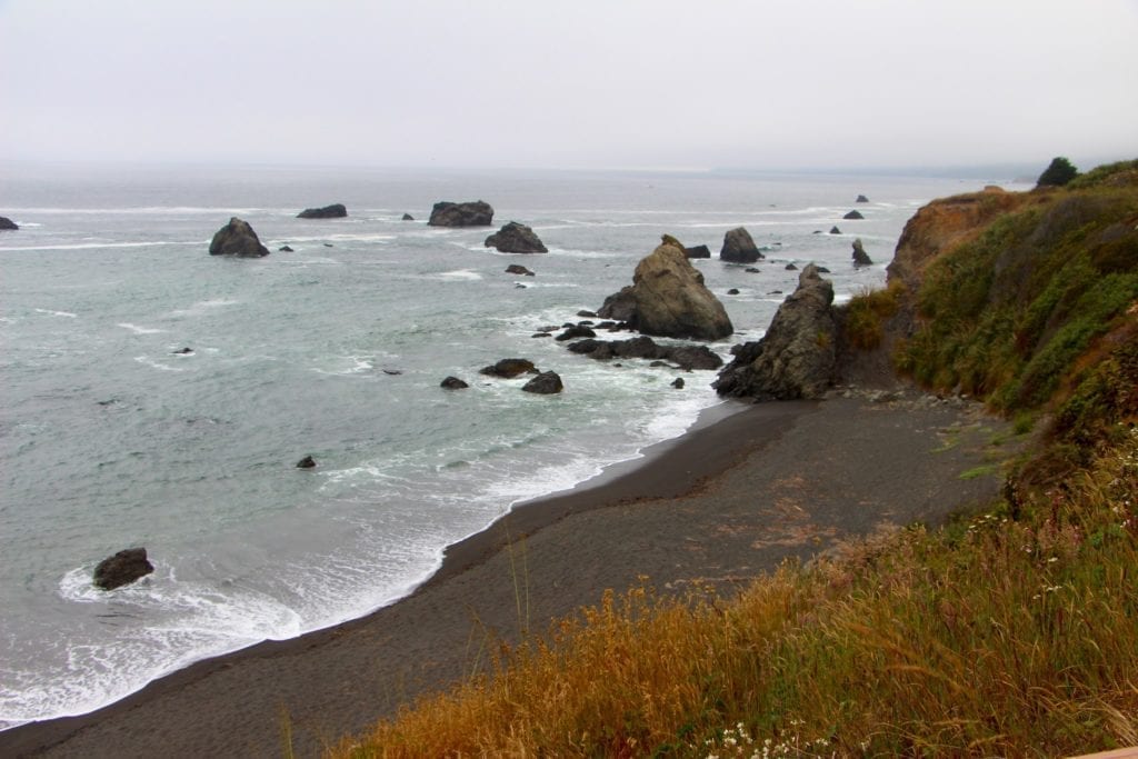 The hidden beach at Westport Headlands, across the road from the Westport Hotel