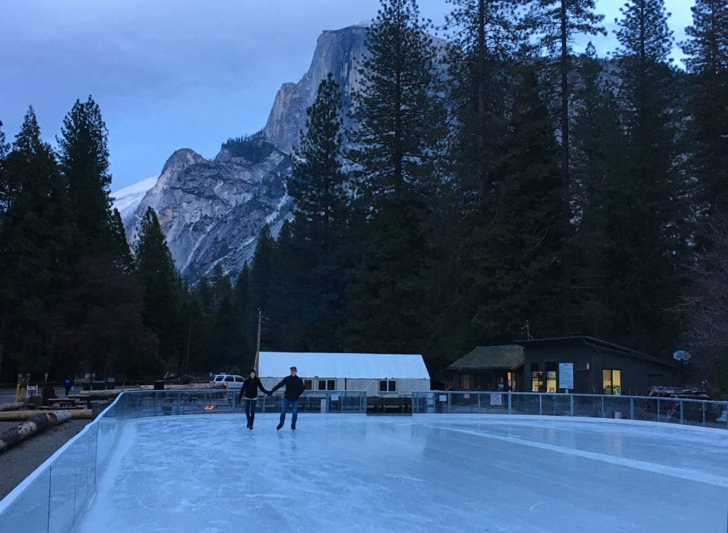 Ice skating under Half Dome in Yosemite