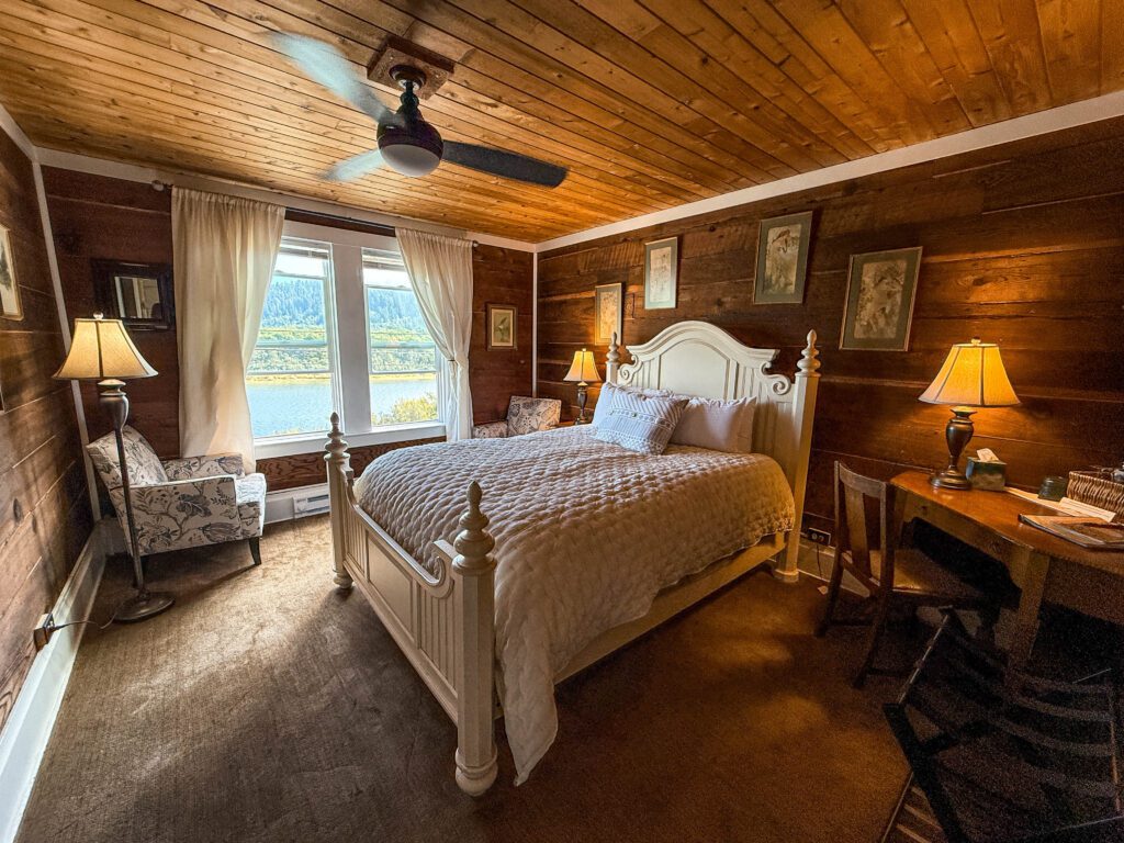 Emerald Ridge Room with exposed original redwood wall construction at the Historic Requa Inn