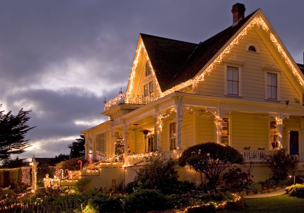 The MacCallum House Inn decorated in lights