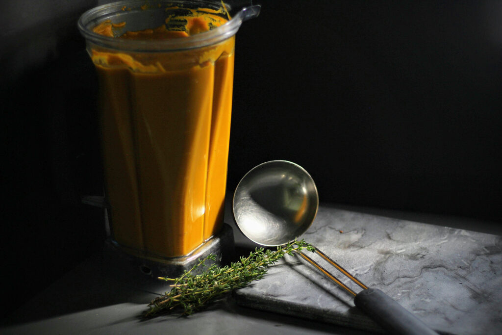 Blend the soup until smooth, then add water, cream or milk to finish.