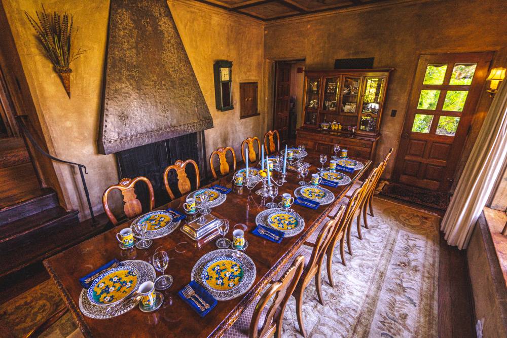 Hammered metal fireplace in the dining room of the Old Monterey Inn