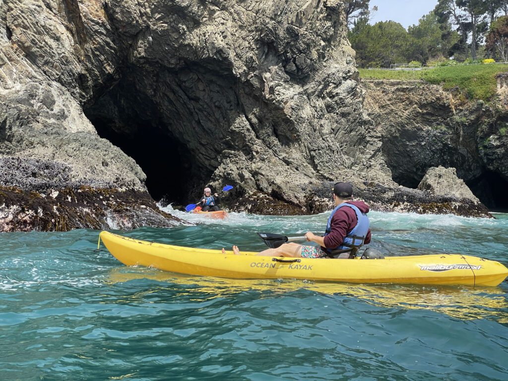 Kayaking through sea caves at Van Damme State Park with Kayak Mendocino