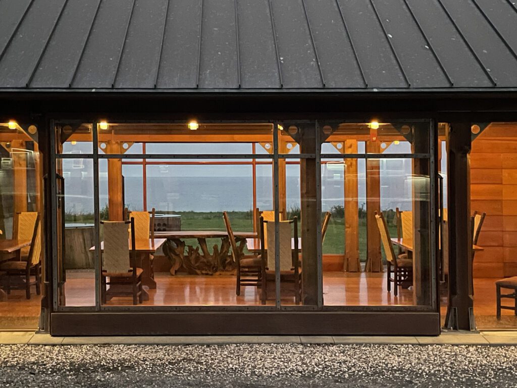 Glass barn doors of the dining room at The Inn at Newport Ranch