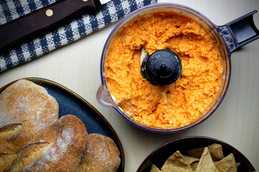Blended pimento cheese ingredients in the food processor.