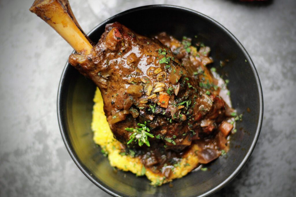 Braised Lamb Shanks served over polenta