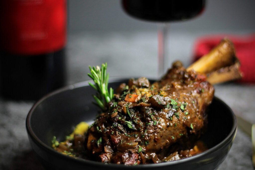 Braised lamb shanks served over polenta