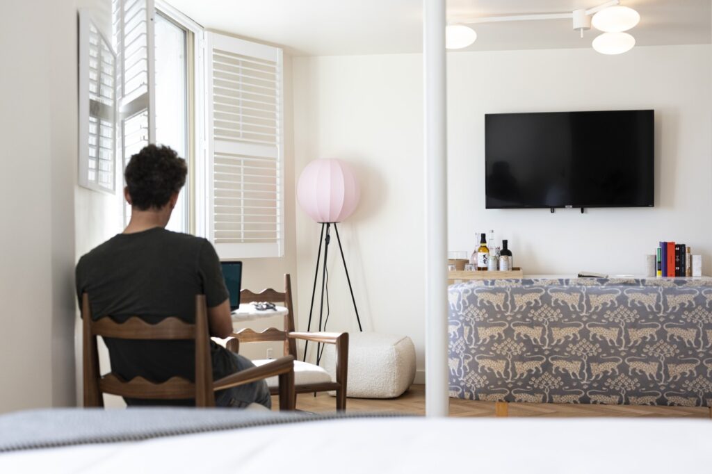 Man working in a studio at Short Stories