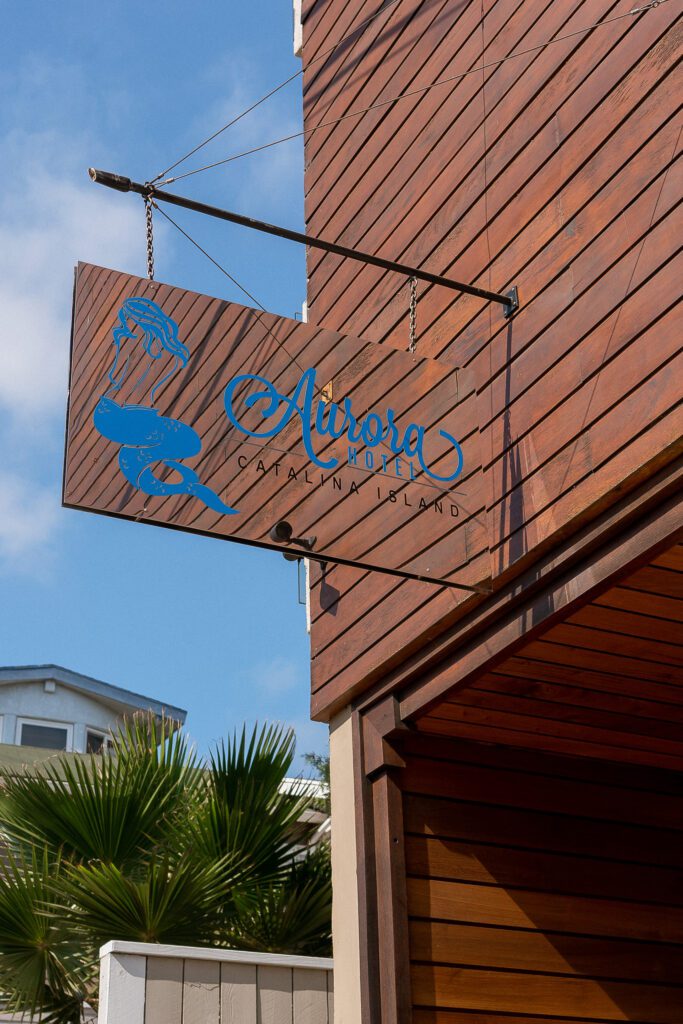 Sign above the entrance to the Aurora Hotel