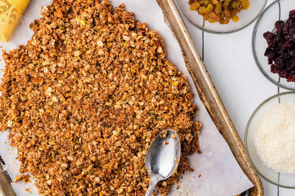 baked granola on a sheet pan
