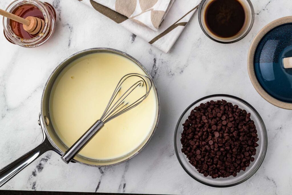 Scalding cream in a pan