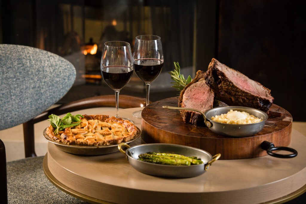Prime rib, mashed potatoes, asparagus, pumpkin pie, and wine served fireside at Terra