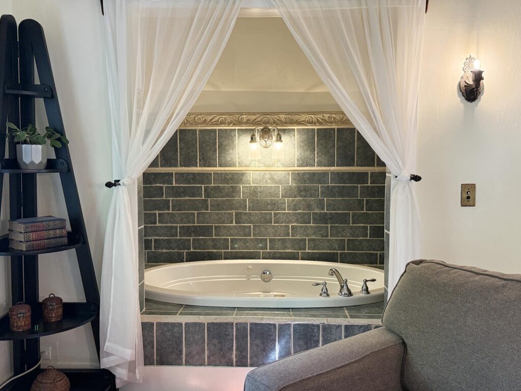 The recessed Jacuzzi tub in the Honeycomb Suite at Sand Rock Farm