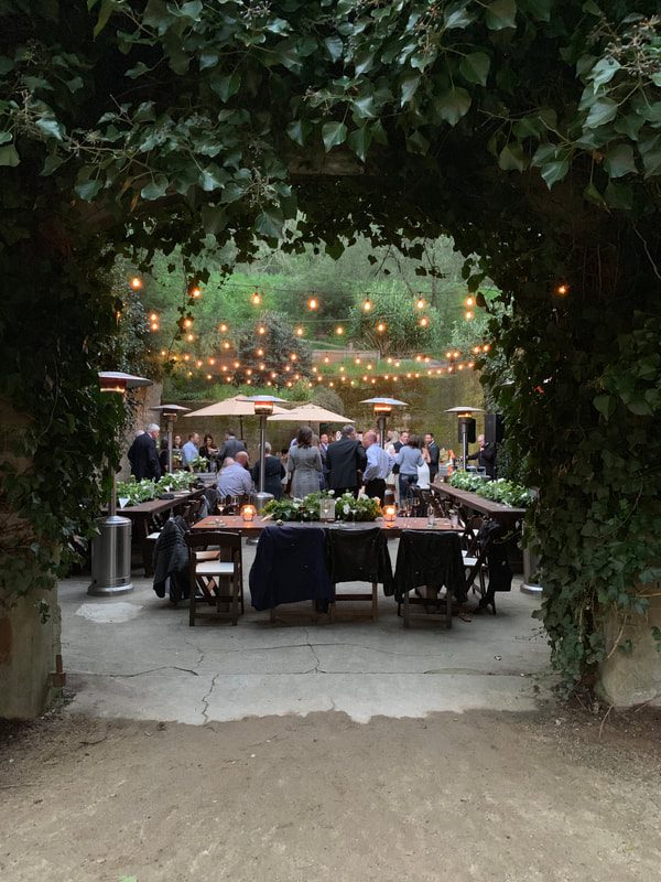 An event held in the ruins of the barrel aging cellar at Sand Rock Farm