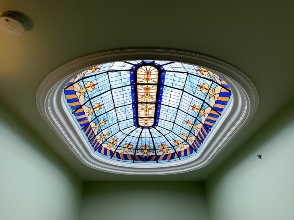 The stained glass skylight in the stairwell of the West Cliff Inn