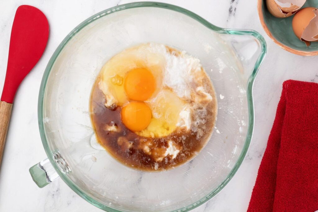 Eggs, coffee, and peppermint extract added to the creamed sugar