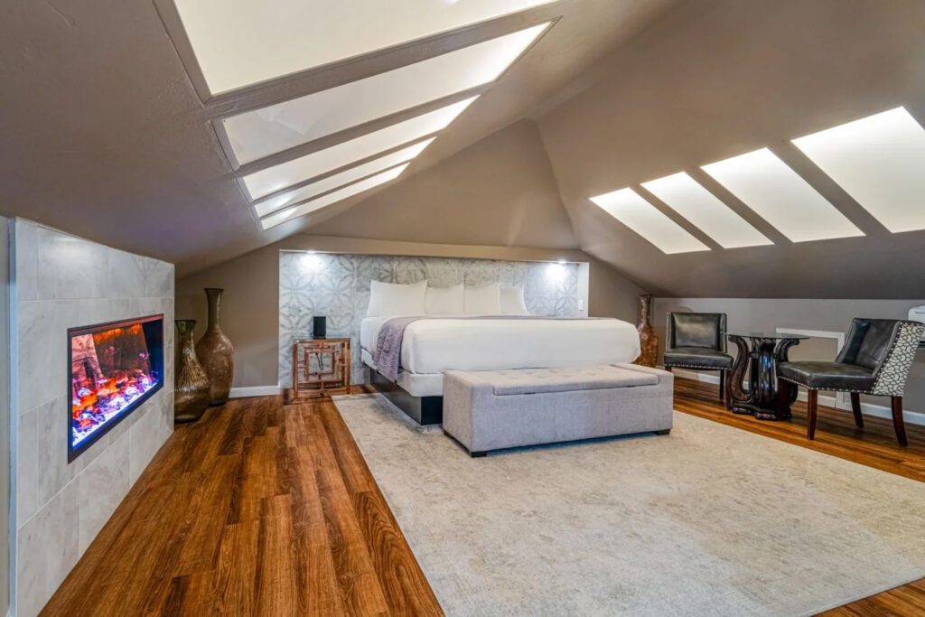 The Happiness Suite at the Inn & Spa at Parkside with skylights and a fireplace