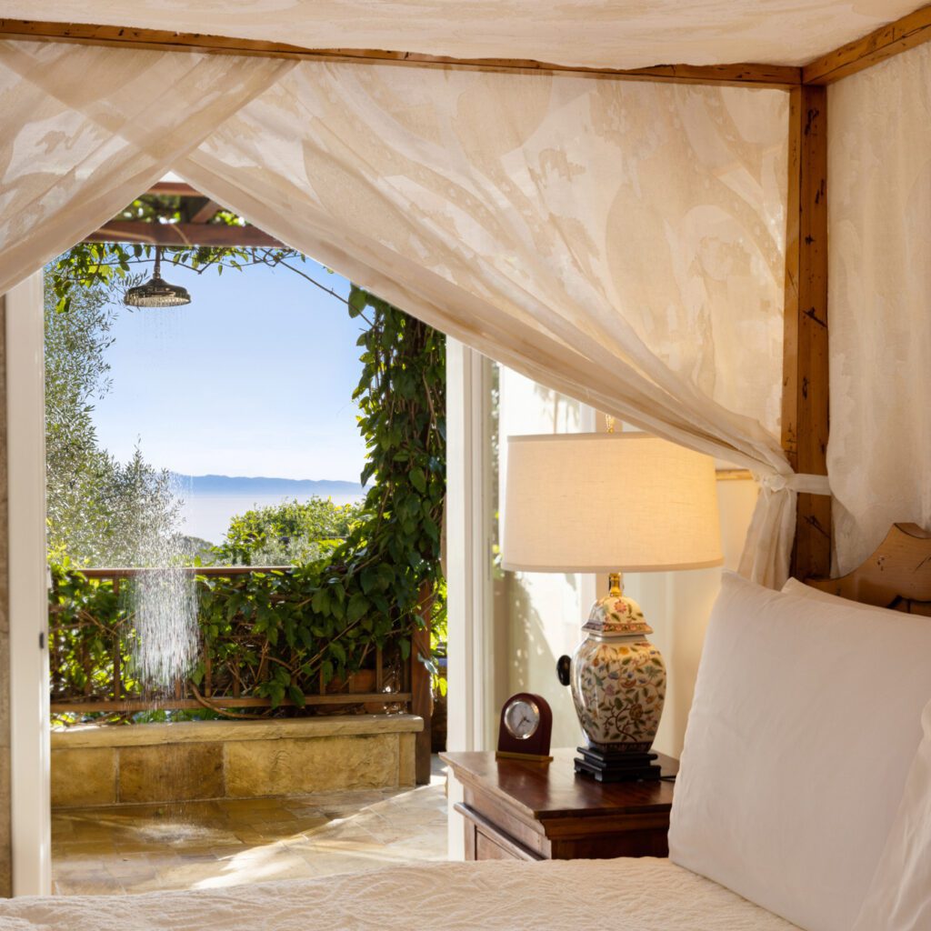 An outdoor shower with ocean views from the Kennedy Cottage at San Ysidro Ranch