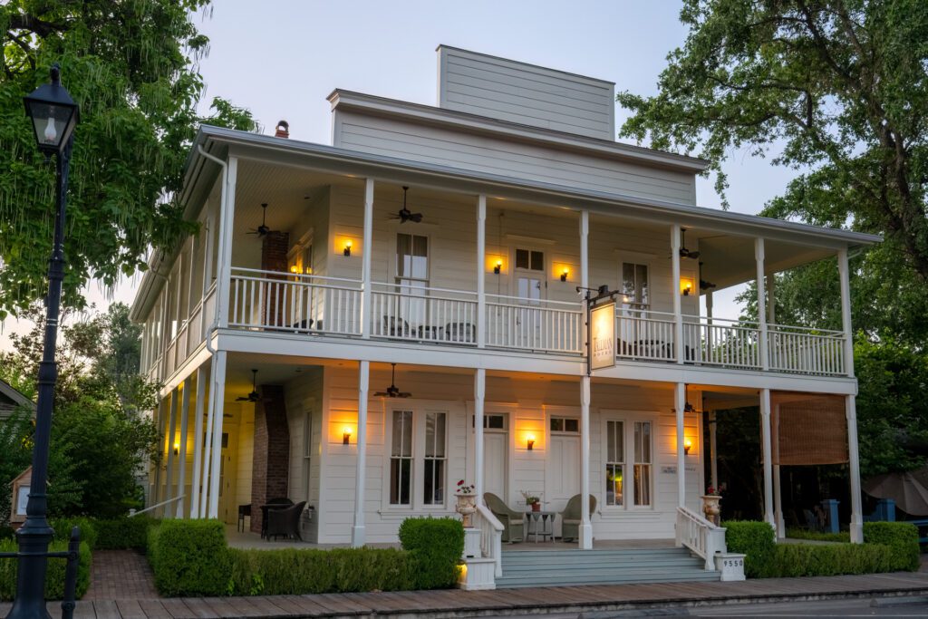 The Tallman Hotel exterior at dusk
